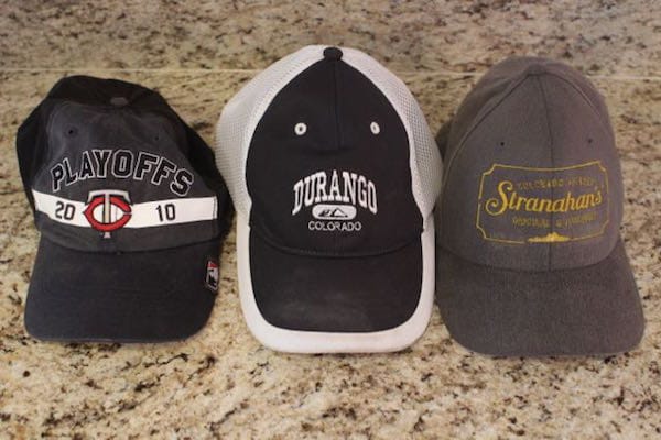 Washed caps to the right and left; unwashed "control" cap in the middle.