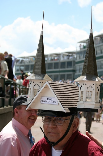 Man wearing kentucky derby hat.