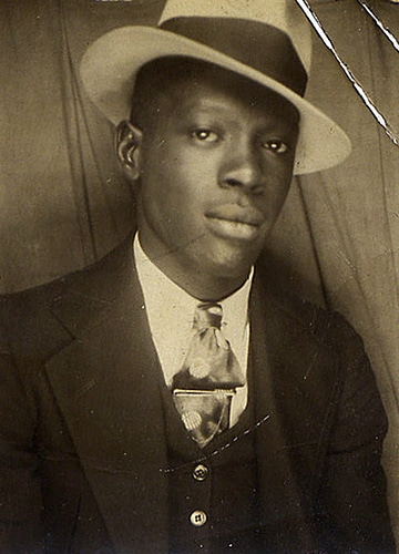 A man wearing a men's hat.