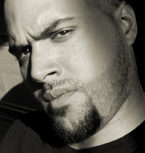 A professional photographer with a beard.
