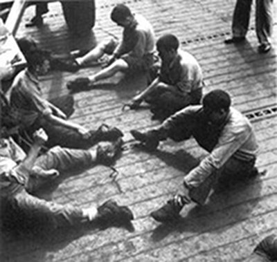 mumbleypeg2 Vintage men sitting and playing mumblety-peg pocket knife.