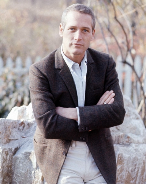 Vintage man standing outside for a portrait in a wool sports jacket.