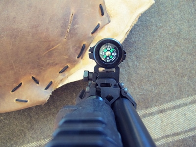 Survival shotgun modified zombie apocalypse compass mounted.