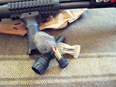 Survival shotgun modified zombie apocalypse fire kit.