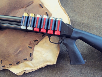Survival shotgun modified zombie apocalypse side saddle.